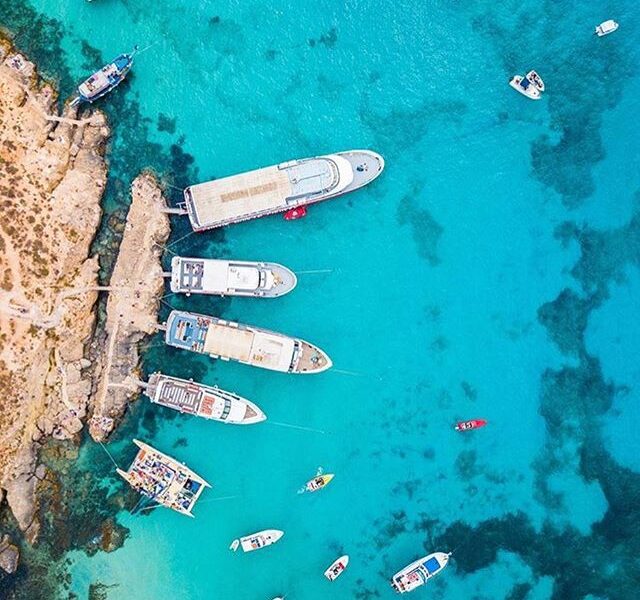 Shared boat tour around Comino, Malta, exploring the Blue Lagoon, Crystal Lagoon and clear Mediterranean waters with Outdoor Explorers Malta.