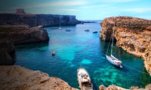 Private boat trip at Blue Lagoon and Crystal Lagoon Malta, swimming and sightseeing around Comino and Gozo in clear blue sea