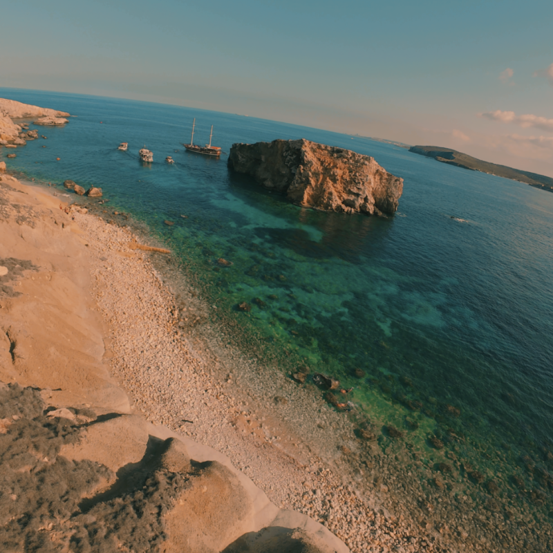 Żrieżaq Bay, a secluded beach with crystal-clear waters, perfect for a private boat trip away from the crowds.