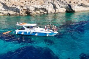 Large private boat in Malta hosting a hen party for big groups, enjoying calm blue water and a fun, social boat charter experience.