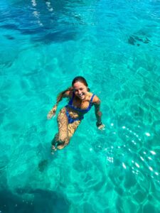 lady in blue blue lagoon malta crystal clear water comino swimming turquoise sea private boat tour