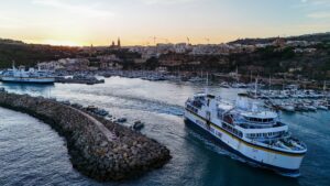 Mgarr Harbour Gozo ferry terminal with boats arriving in Malta crystal clear water port view